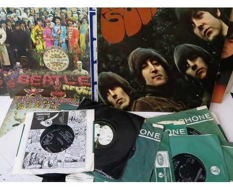 A collection of Beatles LPs and 45rpm singles to include The Beatles White Album with the low number 0036851, (PMC 7067/8-XEX