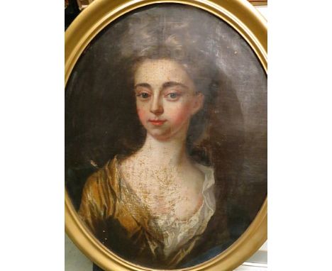 Circa 1780 an oval oil on canvas portrait of a young lady in a yellow silk dress, in a later gilt frame