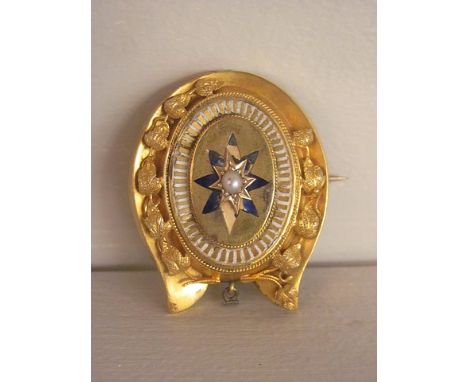 A leather cased 19th century yellow gold brooch set with a single pearl and enamel decoration A/F