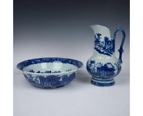 This lovely set features a large pitcher and bowl crafted from white ceramic, adorned with an enchanting old European city sc