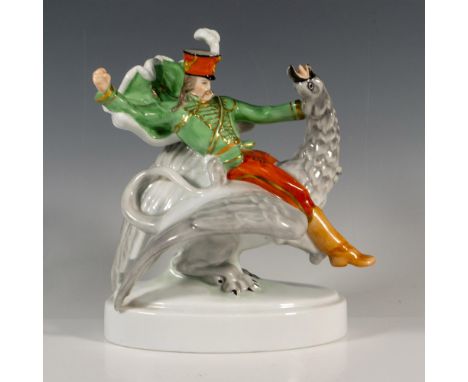 Glossy porcelain, featuring John the Valiant in a dramatic pose riding a Griffin. The man is dressed in a green military-styl