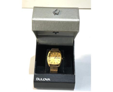 Boxed vintage Bulova longchamp gents wristwatch looks in good overall condition watch winds and ticks but no warranty is give