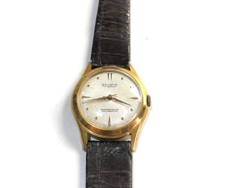Vintage gents Helvetia watch is in working order but no warranty is given overall good condition 