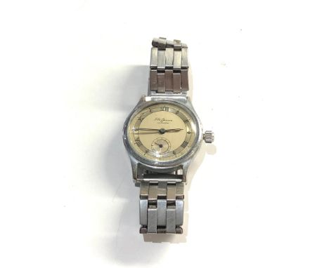 Vintage J. W. BENSON London Round  SS Case approx 33mm Manual Wind 1940'S watch is ticking but no warranty given 