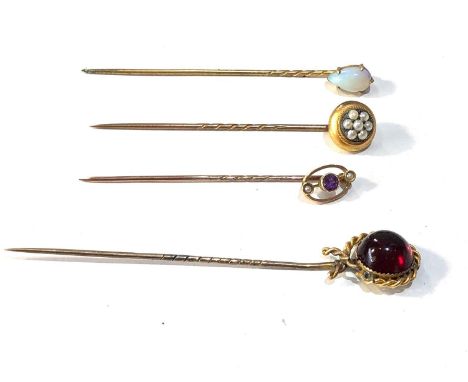 4 antique stick pins set with opal garnet and seed pearls 1 hallmarked 15ct 