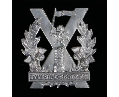 Cap badge to the 20th, 21st, 22nd, 23rd and 29th Battalions The Northumberland Fusiliers (Tyneside Scottish) two loops to the