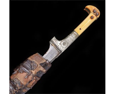 Middle Eastern pesh-kabz dagger, with ivory grip, hilt decorated with stylised flowers, together with scabbard, 31.5cm long