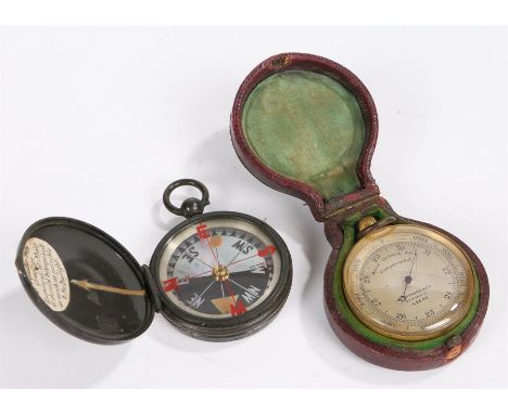 Lucking & Co pocket compensated barometer, in gilt metal with a signed silvered dial, housed within the leather clad case, to