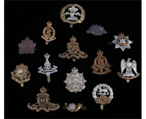 Collection of cap badges to include, The Border Regiment, the Royal Artillery, Kings Own Yorkshire Light Infantry, Royal Scot