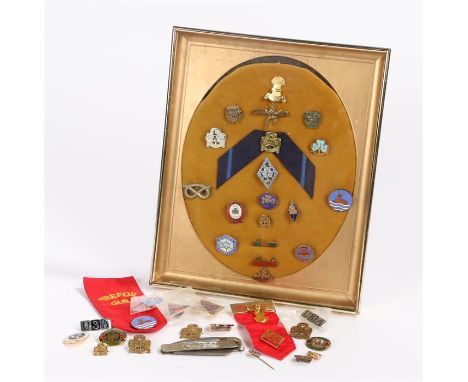 Collection of Girl Guides enamel badges, various types and designs, a selection framed and some loose, (qty)