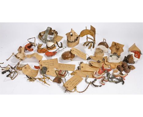 Large collection of 19th Century and later dental items, to include tooth plates, false teeth, tools and moulds, (qty)