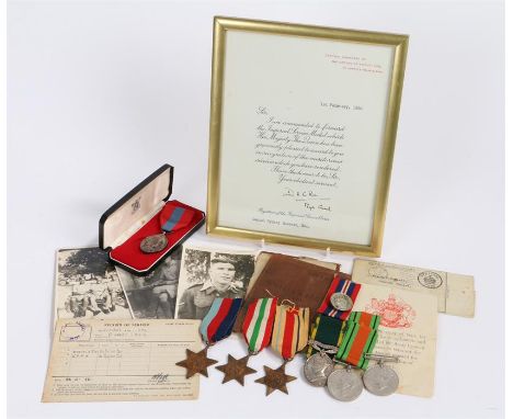 World War Two medal group, to include Defence and War medals, 1939-1945 Star, Africa and Italy Star, Territorial Efficiency m