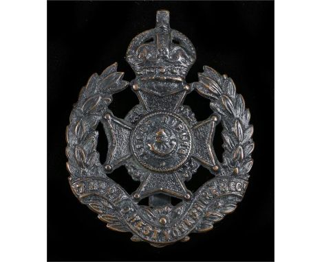 Cap badge to the 7th Battalion the Prince of Wales Own West Yorkshire Regiment (Leeds Rifles) slider to the reverse, K&K 1712