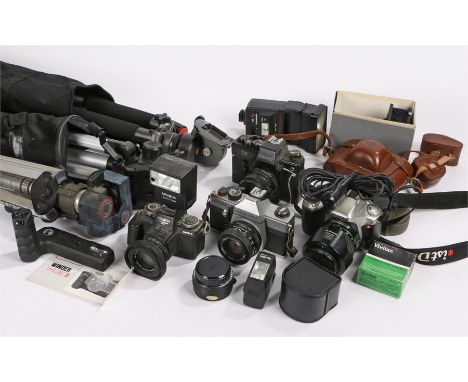 Collection of cameras and camera equipment, to include Praktica MTL 50, Pentax ist D, Zenit 19, flash units, Minolta and lens