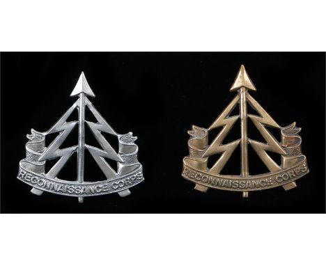 Reconnaissance Corps cap badge in gilding metal, two loops to the reverse, together with another example in white metal, K&K 
