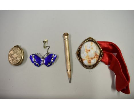 A silver and blue enamel butterly brooch,&nbsp;by J A &amp; S,&nbsp;Birmingham 1918; together with three other items. 