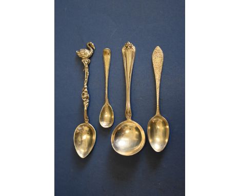 A silver gilt berry spoon, by Thomas Wallis ll, London 1796; together with a George lll sauce ladle, by Charles Hougham, Lond