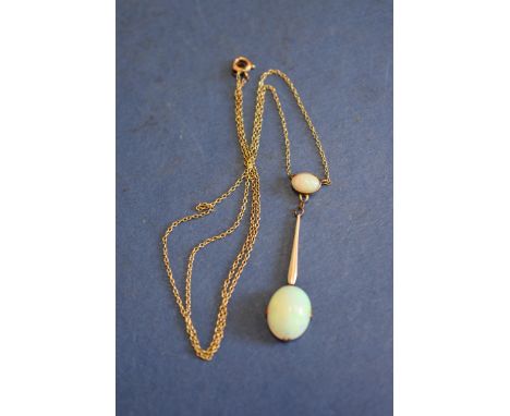 An Art Noveau oval opal pendant,&nbsp;having 15ct gold fine neck chain. 