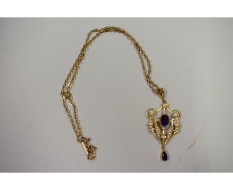 A 15ct gold Art Nouveau amethyst and seed pearl pendant,&nbsp;on an unmarked neck chain. 