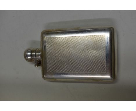 An Asprey of London engine turned silver hip flask, London 2003, 136g. 