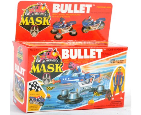 A rare vintage 1980's (1986) Kenner made MASK action figure playset ' Bullet ' with Ali Bombay figure. Factory sealed, the co