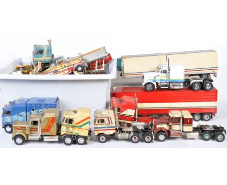 A large collection of original vintage plastic model truck and trailer kits of various makes and scales. Many examples of hau