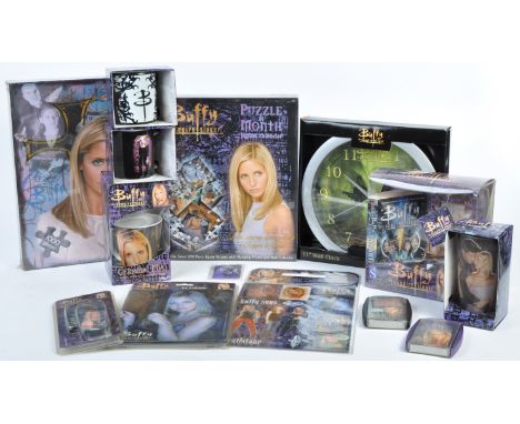 A collection of assorted Buffy The Vampire Slayer memorabilia, to include; x2 Jigsaw Puzzles, a Buffy wall clock, various cer