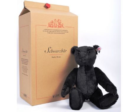 An original Steiff made soft toy teddy bear 660627 ' Schwarzbar '. Black soft pile plush fur having growler to belly with rou