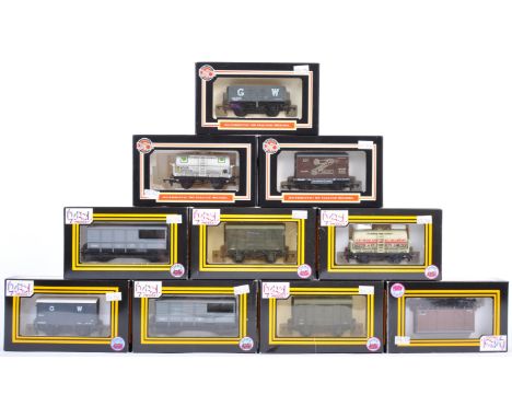 A collection of x10 Dapol 00 gauge model railway trainset locomotive wagons / rolling stock. The collection to include plank 