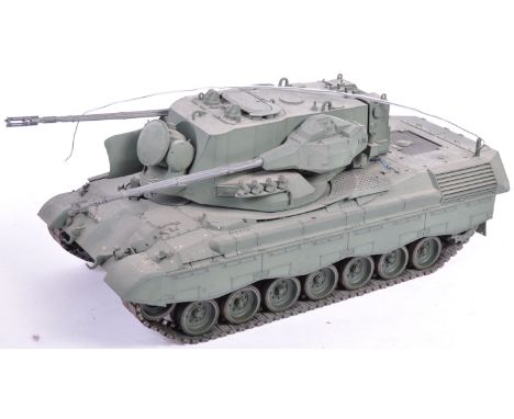 An original Tamiya made Flankpanzer Gepard Tank 1/16 scale plastic model kit. The premade kit appears largely complete and re