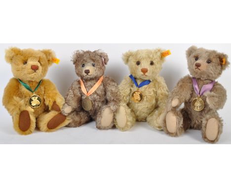 A collection of x4 original German Steiff made ' Danbury Mint 'edition soft toy teddy bears. The bears all having the gold bu