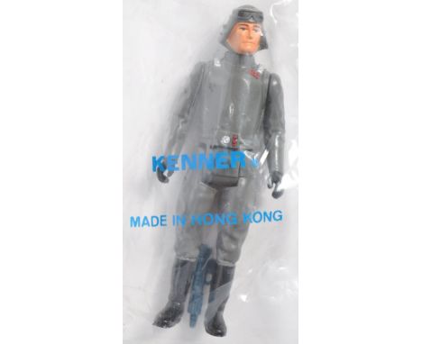 An original vintage Kenner made Star Wars action figure ' Imperial Commander '. Factory sealed within its original Kenner ' B