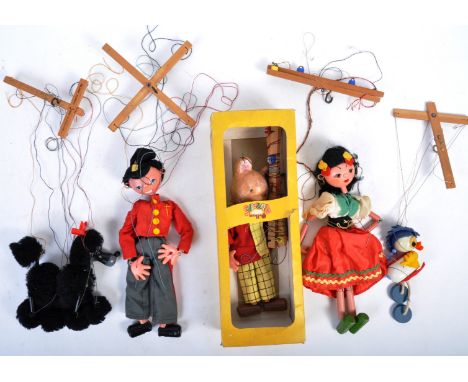 A collection of x5 original English made Pelham string Puppets. The collection to include a boxed Rupert The Bear puppet, a b