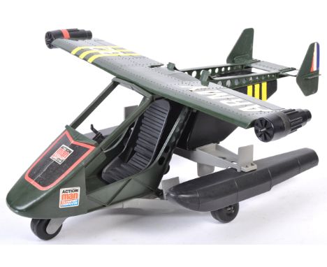 An original vintage Palitoy made Action Man ' Pursuit Craft ' playset. Appears complete with both bombs, wings, floatation de