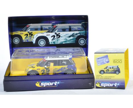 A Scalextric made 1/32 scale Limited Edition slot racing car No. C2599A ' NSCC 25th Anniversary BMW Mini Cooper S '. Contents