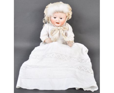 An antique German made C.P Catterfelder Puppenfabrik bisque headed doll. The doll having brown flirty eyes, finely painted lo