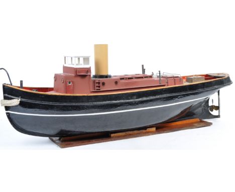 A charming vintage 1950's scratch built model steam engine powered tug boat ' Cullimax '. Originally designed and announced i