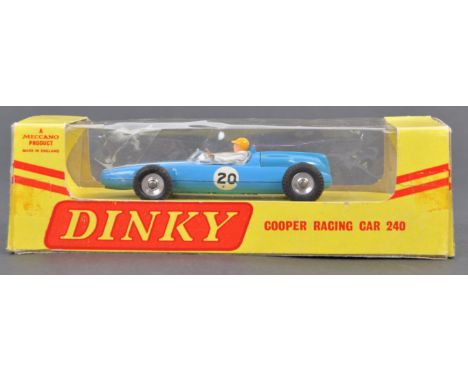 A rare original vintage Dinky Toys made diecast model car No. 284 ' BRM Racing Car '. Blue, No.20 decals, with driver. Model 