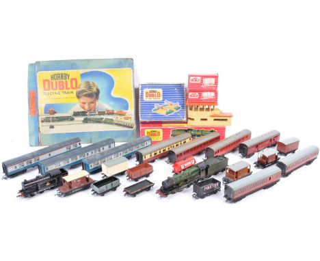 A collection of original vintage Hornby Dublo made 00 gauge model railway train set locomotives and rolling stock to include 