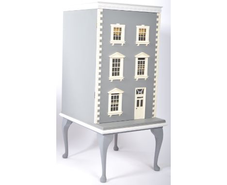 Doll's House - a charming Victorian style three-storey town house dolls / doll's house. The house comprising of three storeys