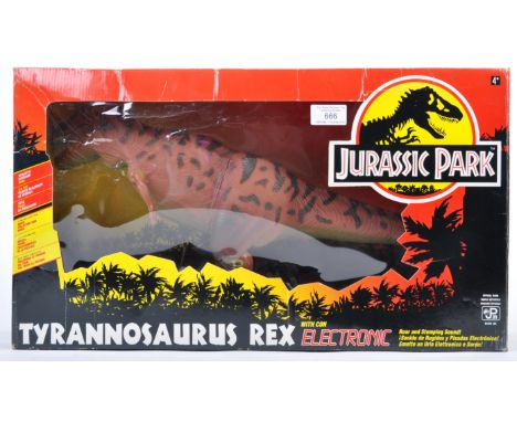 An original 1993 Kenner made Jurassic Park electronic action figure playset model of a T-Rex Tyrannosaurus Rex. The model din