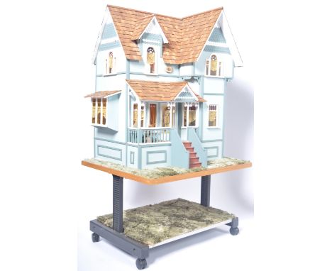 Doll's House - a charming vintage New England style three-storey dolls / doll's house. The house comprising of three storeys,