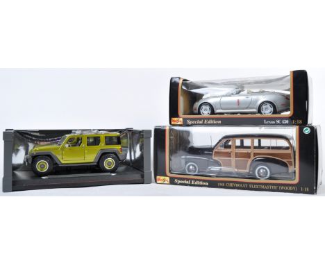 A collection of x3 Maisto made 1/18 precision scale diecast model cars to include a Jeep rescue concept, a 1948 Chevrolet Fle