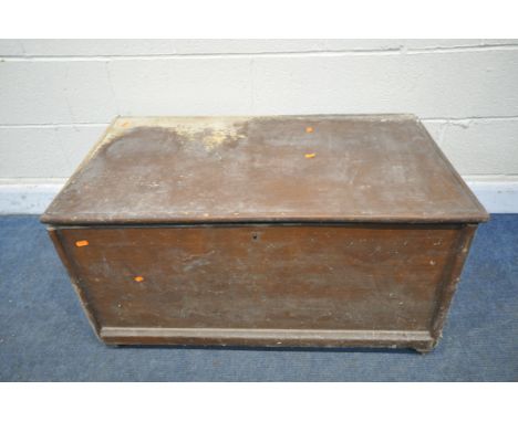 A VINTAGE PINE TOOL CHEST, with a hinged lid, on castors, width 96cm x depth 54cm x height 52cm (condition, ideal for restora