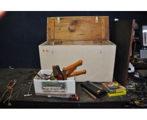 A BESPOKE WOODEN TOOLCHEST CONTAINING TOOLS including a Boss shoe stretcher, two veterinary tools, hammers, scrapers, files, 