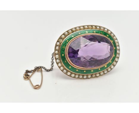 A YELLOW METAL GEM AND ENAMEL BROOCH, of an oval form, set with a large oval cut amethyst, within a green guilloche enamel su