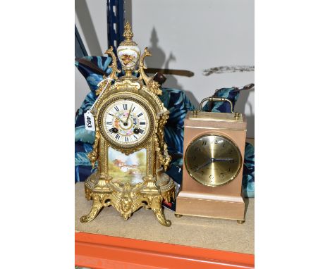 A FRENCH STYLE GILT METAL MANTEL CLOCK, with hand painted porcelain dial and front panel, eight day movement, bell strike, fo