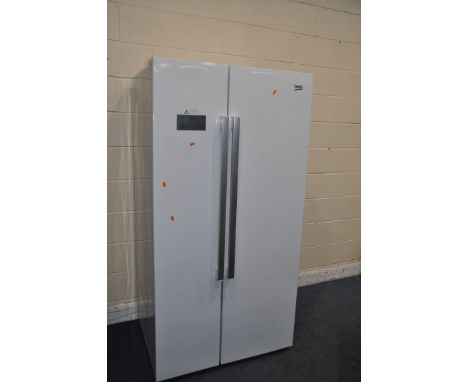 A BEKO ASL141W DOUBLE DOOR FRIDGE FREEZER width 91cm depth 73cm height 179cm (PAT pass and working at 5 and -18 degrees) (Con