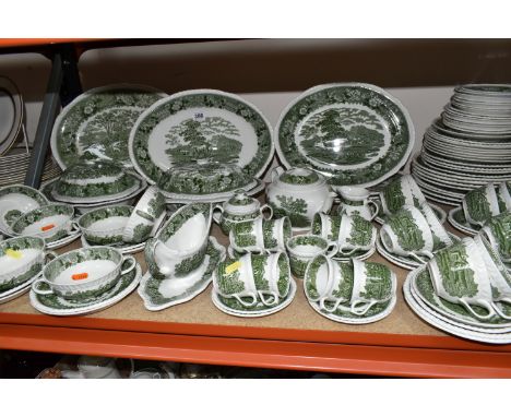 A LARGE QUANTITY OF GREEN AND WHITE ADAMS IRONSTONE 'ENGLISH SCENIC' PATTERN DINNERWARE, comprising two oval meat plates, fou