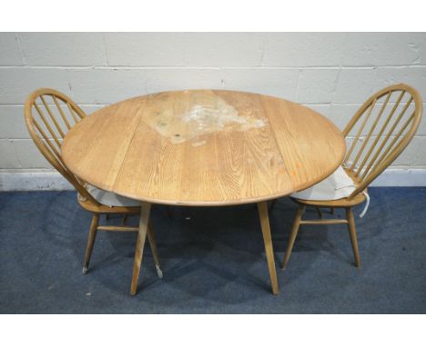 A DISTRESSED ERCOL ELM AND BEECH WINDSOR DROP LEAF DINING TABLE, open length 125cm x closed length 62cm x depth 113cm x heigh